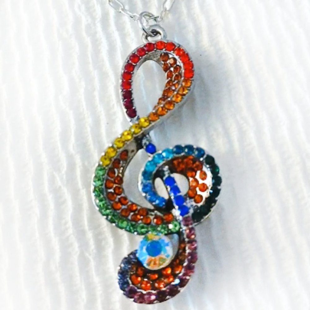 NWOT Gorgeous Rainbow Rhinestone Silvertone G Clef necklace